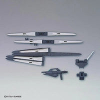 HGBD:R 1/144 No.030 Fake Nu Weapons – unassembled weapon parts on grey backdrop