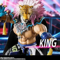 Tekken 8: S.H.Figuarts King – action pose with fists raised, stage backdrop